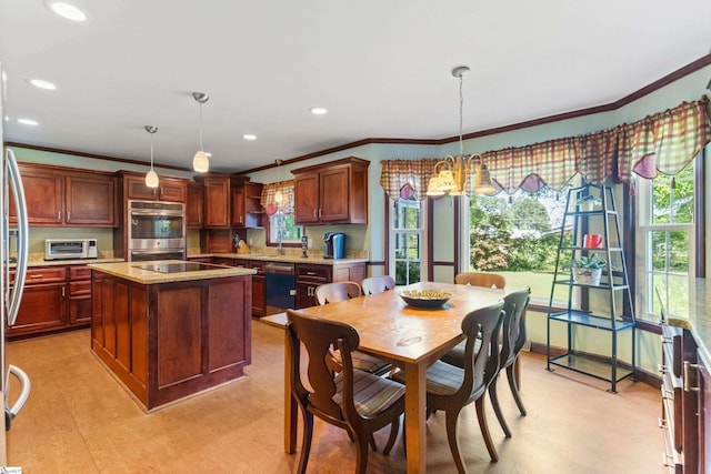 kitchen with electric cooktop, light wood-style floors, dishwashing machine, ornamental molding, and double oven