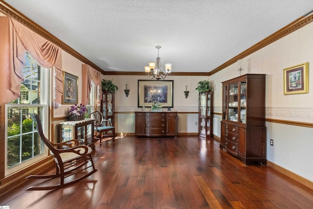 living area with dark wood finished floors, an inviting chandelier, crown molding, baseboards, and a textured ceiling
