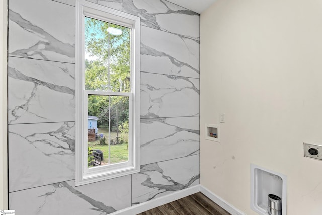 interior space featuring plenty of natural light, hookup for an electric dryer, laundry area, and washer hookup
