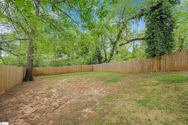 view of yard featuring a fenced backyard