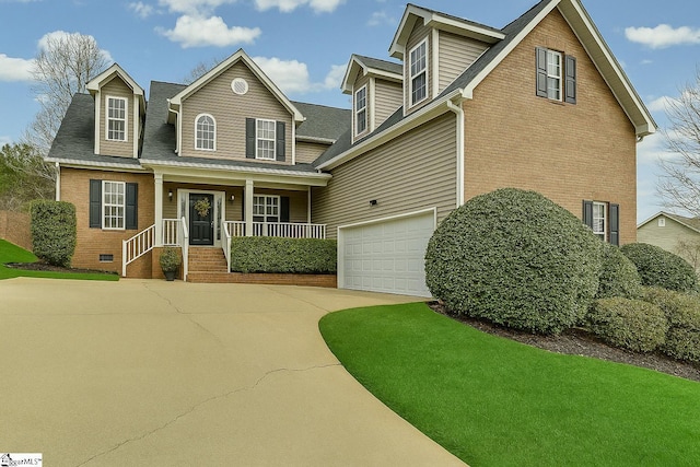 102 Beckworth Dr, Taylors, SC 29687 - view of front facade with brick siding, an attached garage, concrete driveway, and covered porch