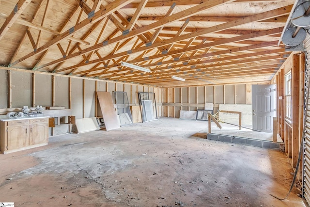 miscellaneous room featuring vaulted ceiling