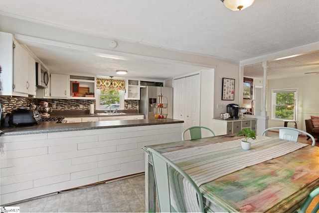 dining area with a textured ceiling