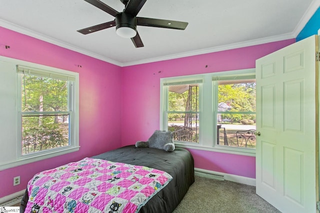 bedroom featuring a baseboard heating unit, carpet flooring, crown molding, and multiple windows