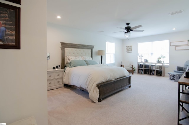 carpeted bedroom with recessed lighting, visible vents, and ceiling fan