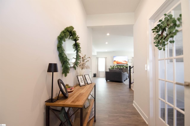 hall with recessed lighting and dark wood-style flooring