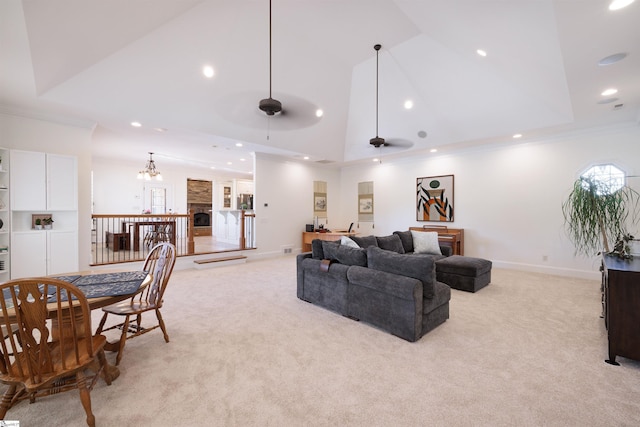 living room with light colored carpet, a ceiling fan, crown molding, and high vaulted ceiling