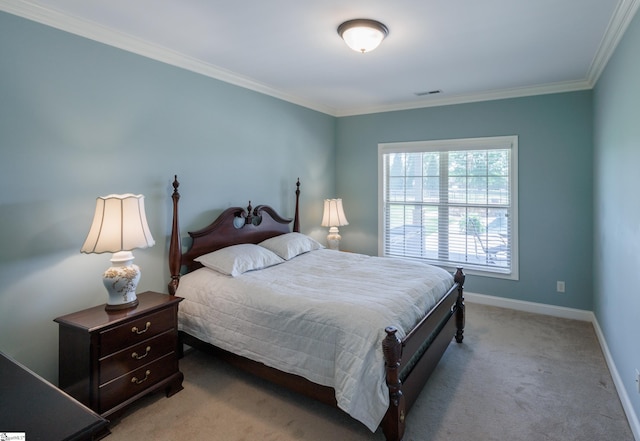 bedroom with baseboards, ornamental molding, visible vents, and carpet floors
