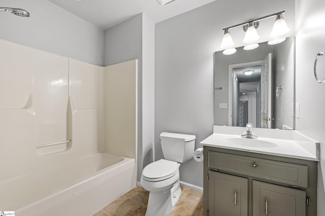 full bath with baseboards, vanity, washtub / shower combination, and toilet