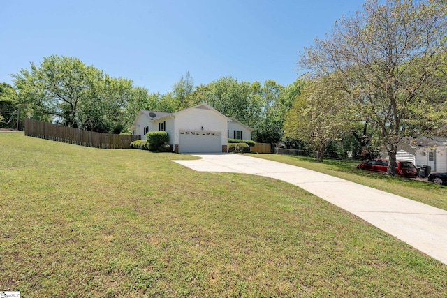 single story home featuring fence, driveway, a front yard, and a garage