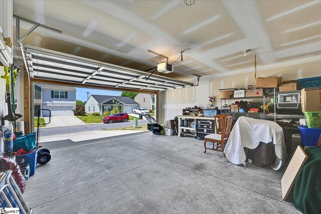 garage featuring a garage door opener