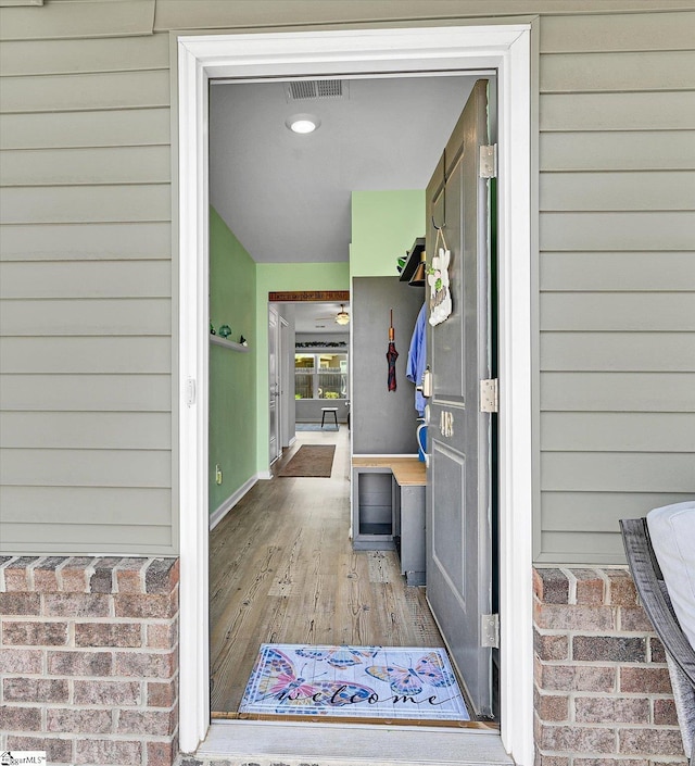 doorway to property featuring visible vents