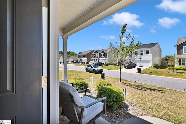 exterior space with a residential view and covered porch