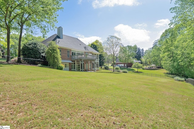 view of yard with a fenced backyard and a deck