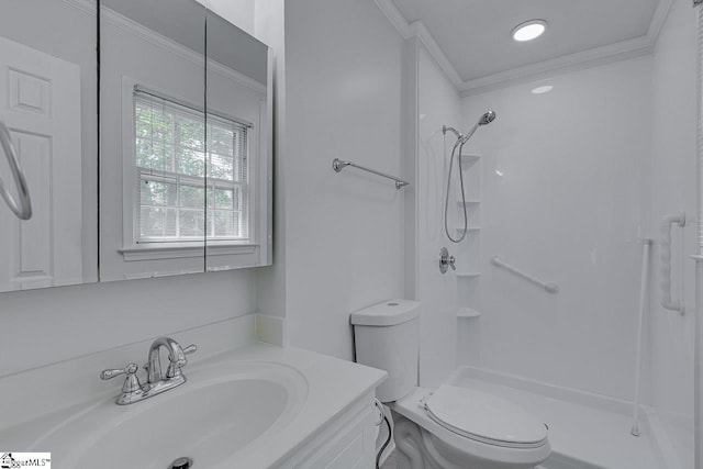 bathroom with toilet, ornamental molding, vanity, and a shower