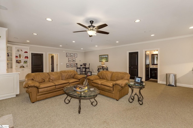 carpeted living room featuring recessed lighting, crown molding, ceiling fan, and baseboards