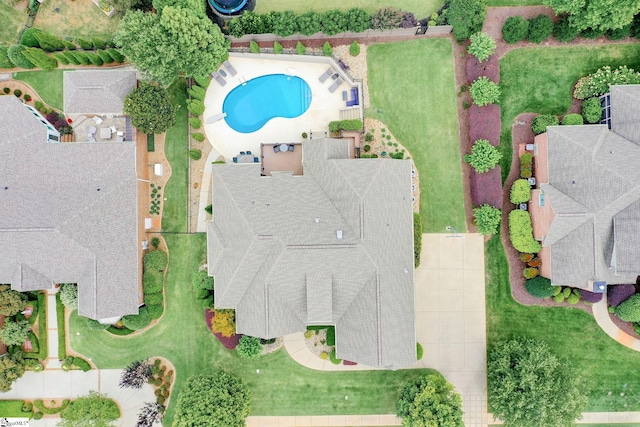drone / aerial view of a pool