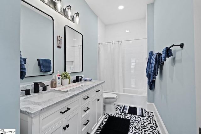 501 N Adair St, Clinton, SC 29325 - full bathroom featuring tile patterned floors, a sink, double vanity, toilet, and shower / bath combo with shower curtain