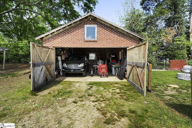 501 N Adair St, Clinton, SC 29325 - view of outbuilding with fence and an outdoor structure