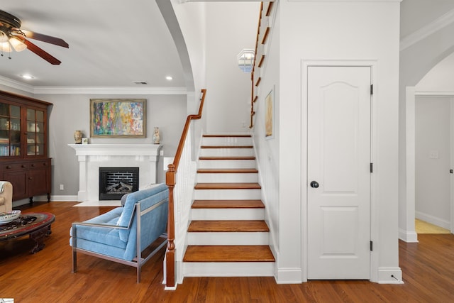 504 Anderson St, Greenville, SC 29601 - stairs featuring recessed lighting, visible vents, arched walkways, crown molding, and ceiling fan