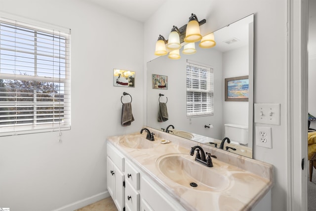 504 Anderson St, Greenville, SC 29601 - bathroom featuring a sink, visible vents, and plenty of natural light