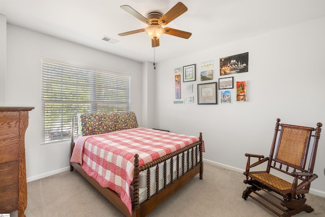 504 Anderson St, Greenville, SC 29601 - bedroom featuring ceiling fan, light carpet, visible vents, and baseboards