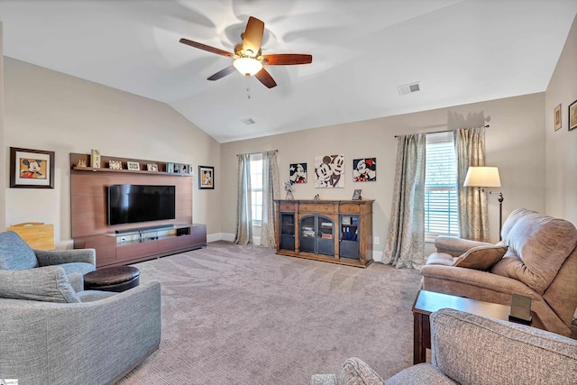 living area with carpet flooring, baseboards, visible vents, lofted ceiling, and a ceiling fan