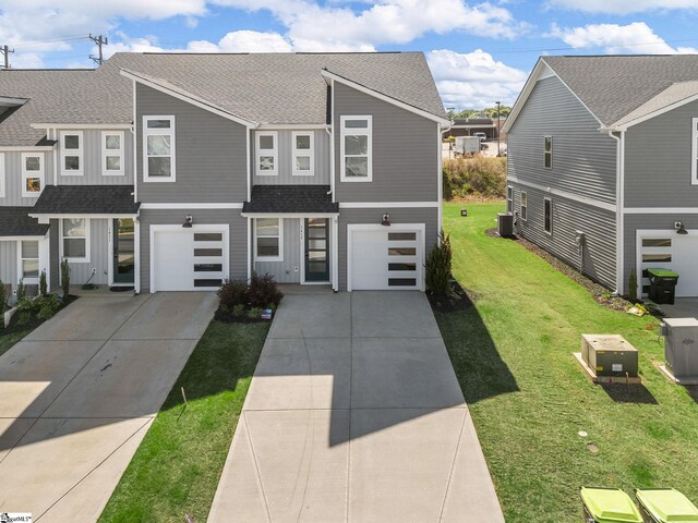 1415 Darrowby Way, Spartanburg, SC 29301 - view of property with a garage, central air condition unit, driveway, and a shingled roof