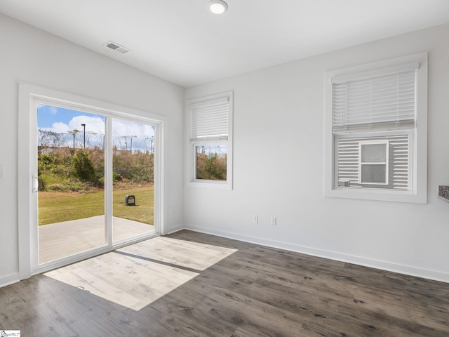 1415 Darrowby Way, Spartanburg, SC 29301 - unfurnished room with visible vents, baseboards, recessed lighting, and dark wood-style floors