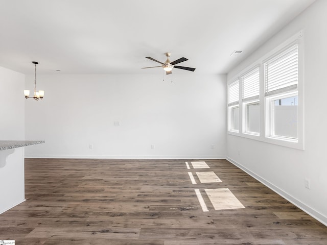 1415 Darrowby Way, Spartanburg, SC 29301 - unfurnished room with dark wood-style floors, visible vents, baseboards, and ceiling fan with notable chandelier