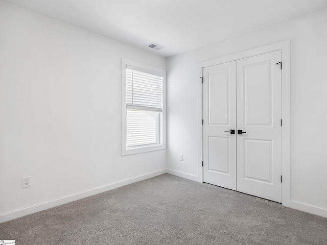 1415 Darrowby Way, Spartanburg, SC 29301 - unfurnished bedroom with a closet, carpet floors, visible vents, and baseboards