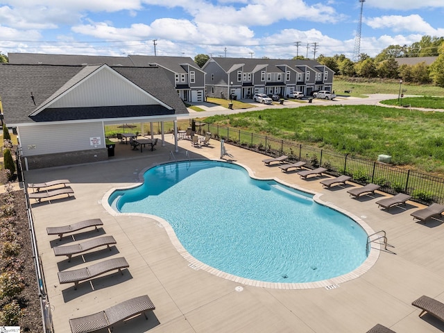 1415 Darrowby Way, Spartanburg, SC 29301 - community pool with fence, a patio area, a yard, and a residential view