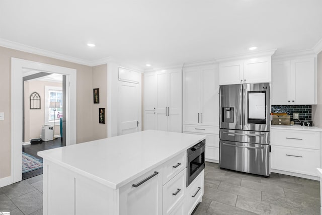 204 Thackston St, Fountain Inn, SC 29644 - kitchen featuring baseboards, appliances with stainless steel finishes, and light countertops