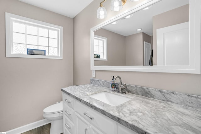 204 Thackston St, Fountain Inn, SC 29644 - half bath with baseboards, toilet, and vanity