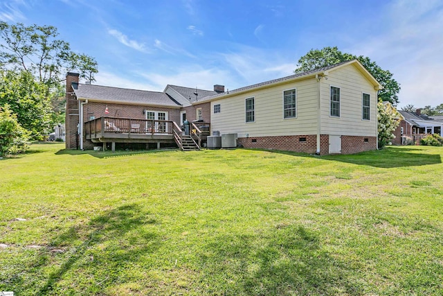 204 Thackston St, Fountain Inn, SC 29644 - rear view of house featuring a wooden deck, a lawn, crawl space, and central AC unit