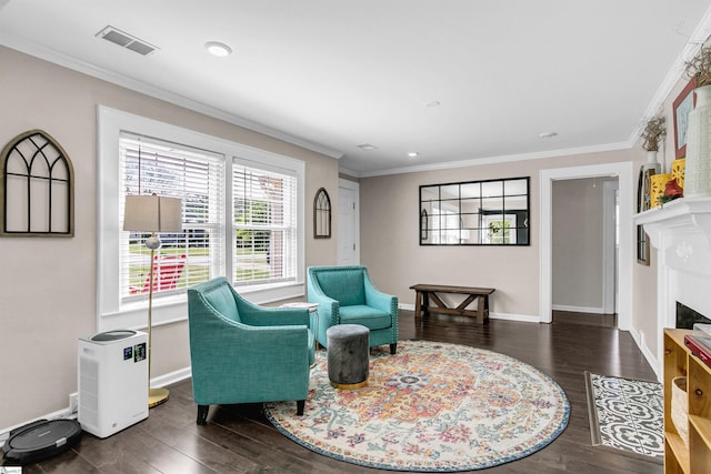 204 Thackston St, Fountain Inn, SC 29644 - sitting room featuring crown molding, wood finished floors, a fireplace, baseboards, and visible vents