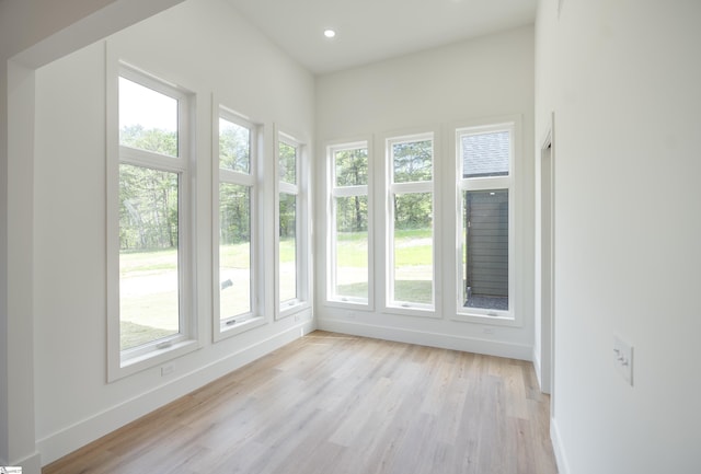 545 E Airport Rd, Greer, SC 29651 - unfurnished sunroom with wood finished floors, baseboards, recessed lighting, and a healthy amount of sunlight