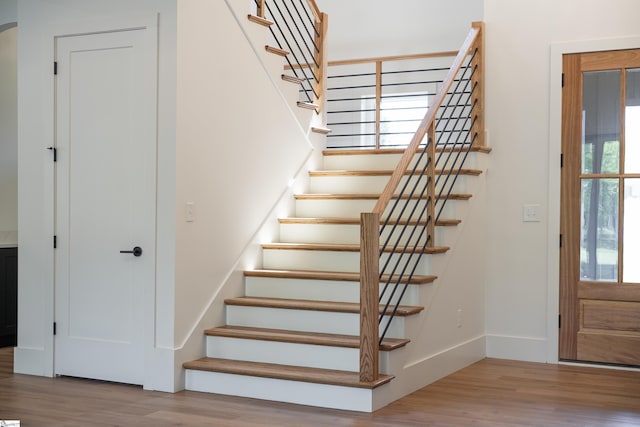 545 E Airport Rd, Greer, SC 29651 - stairway featuring baseboards and wood finished floors