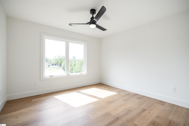 545 E Airport Rd, Greer, SC 29651 - unfurnished room with visible vents, light wood-style flooring, and baseboards