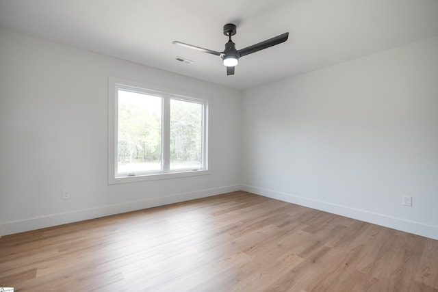545 E Airport Rd, Greer, SC 29651 - empty room with ceiling fan, baseboards, visible vents, and light wood-style flooring