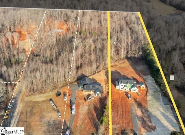 545 E Airport Rd, Greer, SC 29651 - birds eye view of property featuring a wooded view