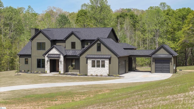 545 E Airport Rd, Greer, SC 29651 - modern farmhouse with an attached garage, a standing seam roof, a shingled roof, and a front yard