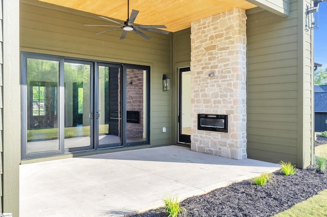 545 E Airport Rd, Greer, SC 29651 - view of patio featuring an outdoor stone fireplace and a ceiling fan