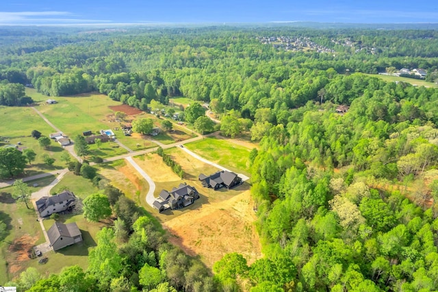 545 E Airport Rd, Greer, SC 29651 - birds eye view of property featuring a forest view