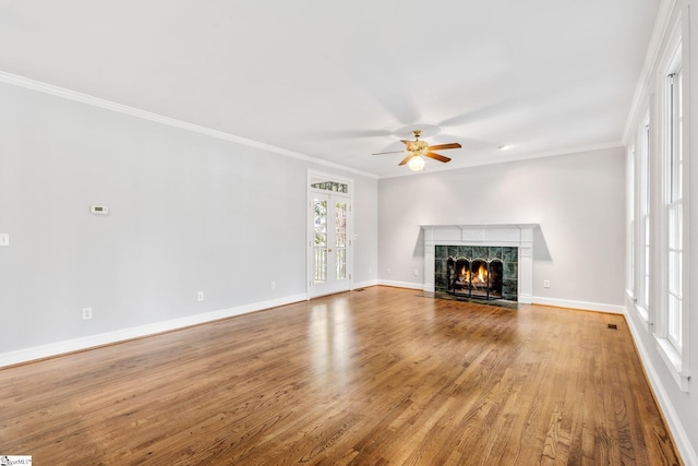 8 Atchison Way, Simpsonville, SC 29680 - unfurnished living room featuring baseboards, wood finished floors, ceiling fan, a fireplace, and ornamental molding