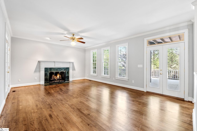 8 Atchison Way, Simpsonville, SC 29680 - unfurnished living room with a fireplace, plenty of natural light, a ceiling fan, and ornamental molding