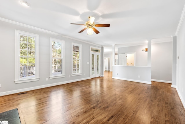 8 Atchison Way, Simpsonville, SC 29680 - unfurnished living room featuring wood finished floors, visible vents, a ceiling fan, and ornamental molding