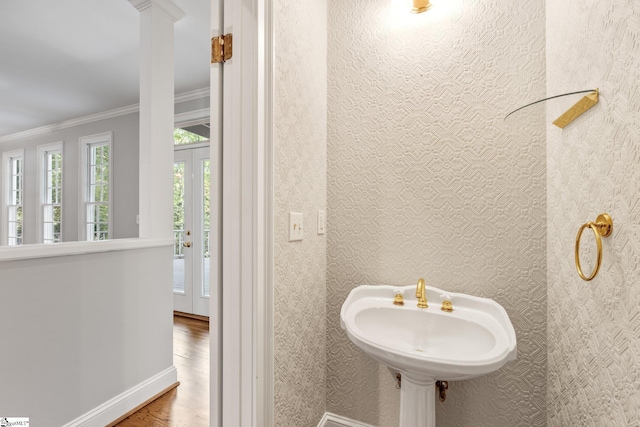 8 Atchison Way, Simpsonville, SC 29680 - bathroom featuring baseboards, ornamental molding, and wood finished floors