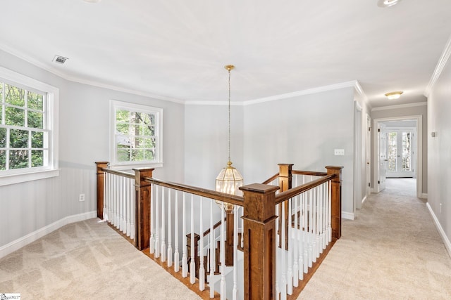 8 Atchison Way, Simpsonville, SC 29680 - hallway featuring light colored carpet, crown molding, and an upstairs landing