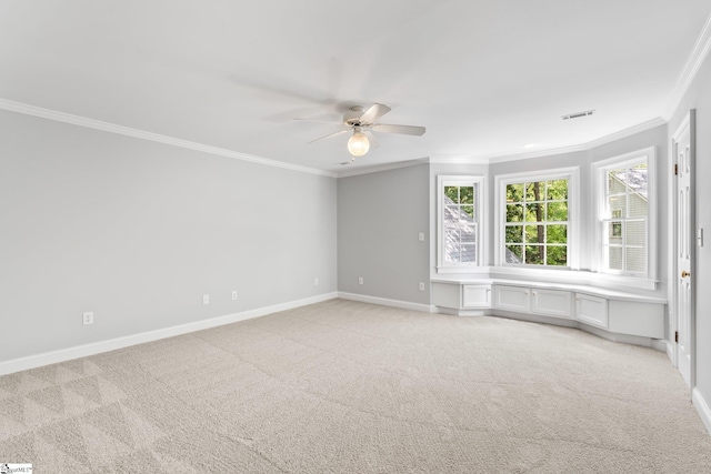 8 Atchison Way, Simpsonville, SC 29680 - unfurnished room with visible vents, baseboards, light colored carpet, ceiling fan, and crown molding